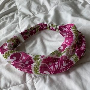 Pink and green Vera Bradley stretchy headband.